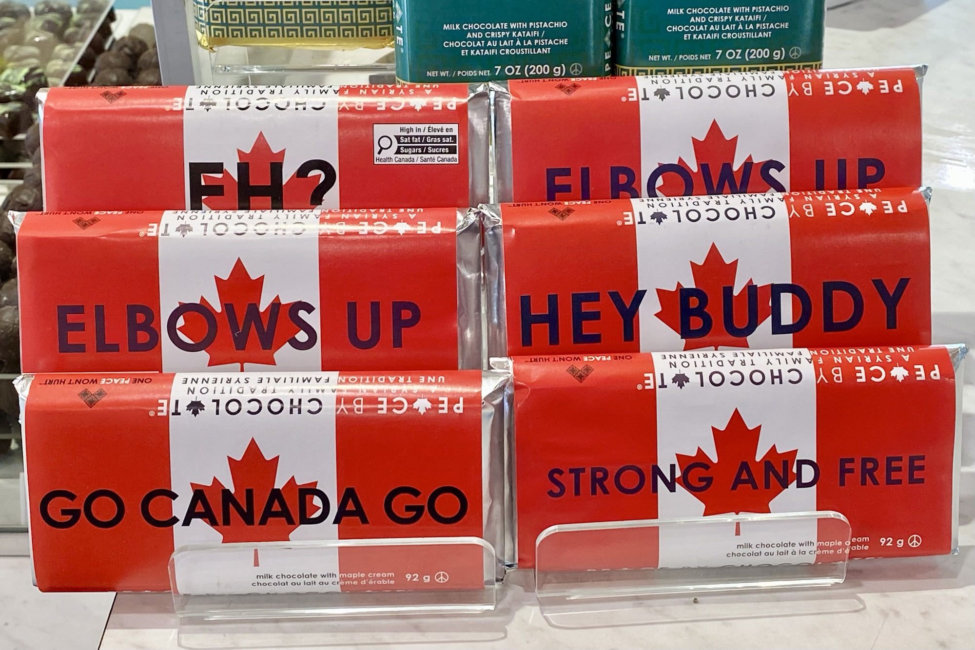 Chocolate bars from Peace by Chocolate labelled with pro-Canada slogans.