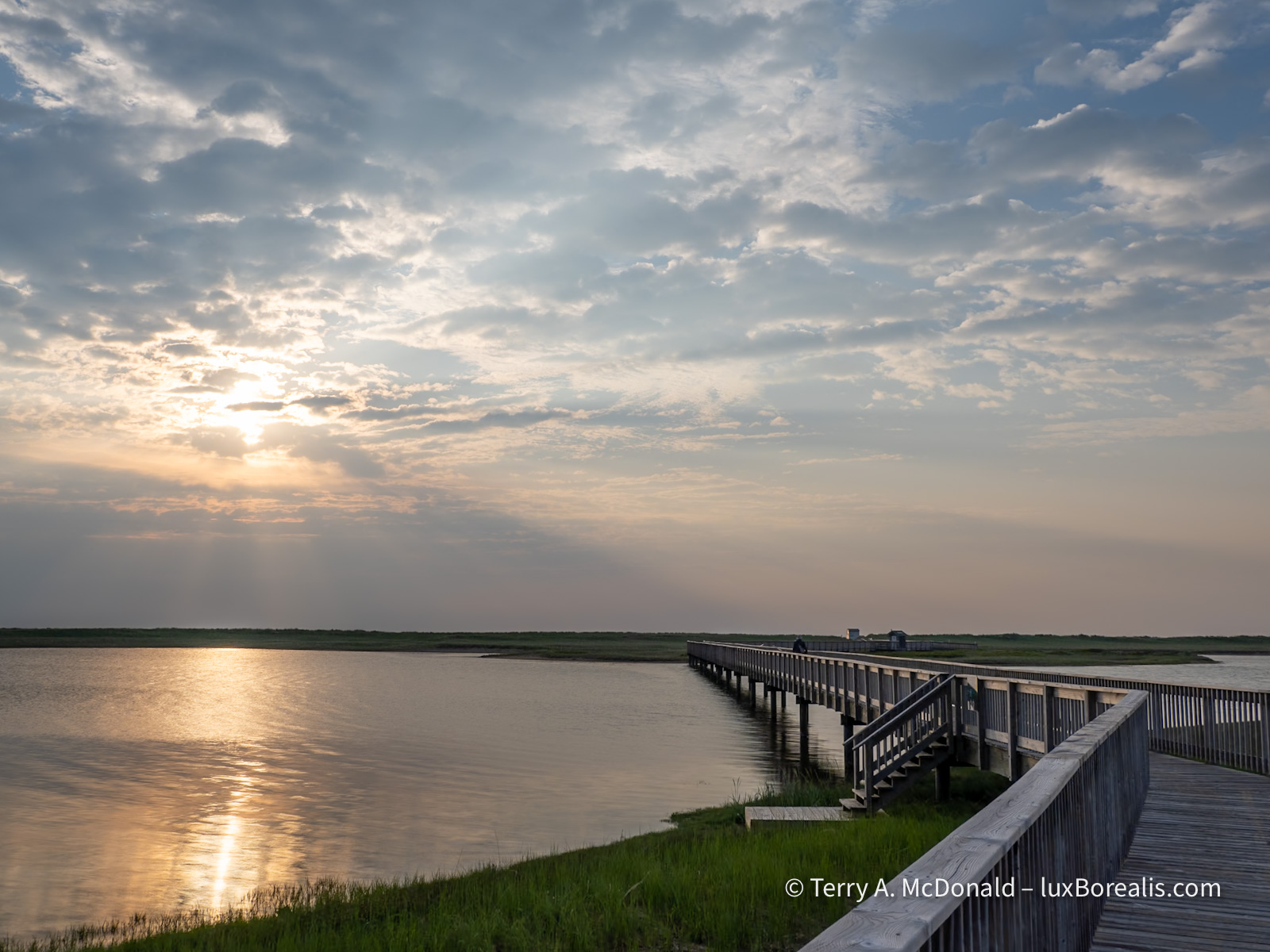 Morning sun over the boardwalk to Kelly’s Beach, Kouchibouguac National Park, New Brunswick